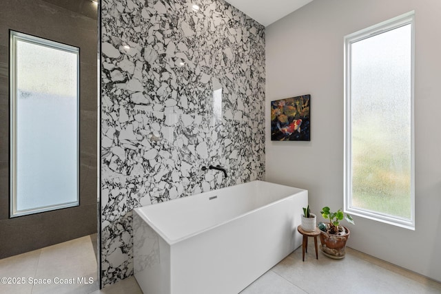 full bath with a freestanding bath and walk in shower