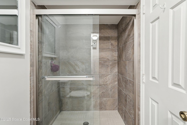 bathroom featuring a stall shower