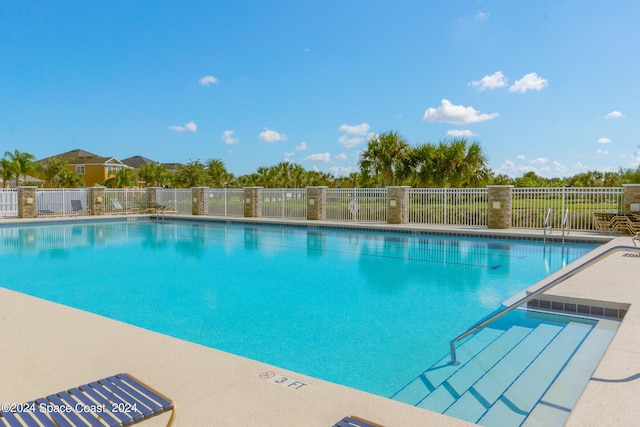community pool with fence