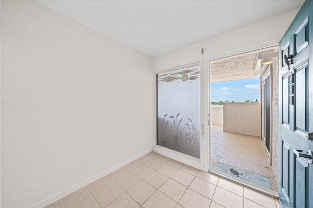 2101 Atlantic St Unit 531, Melbourne Beach, FL 32951 - empty room featuring baseboards and light tile patterned flooring