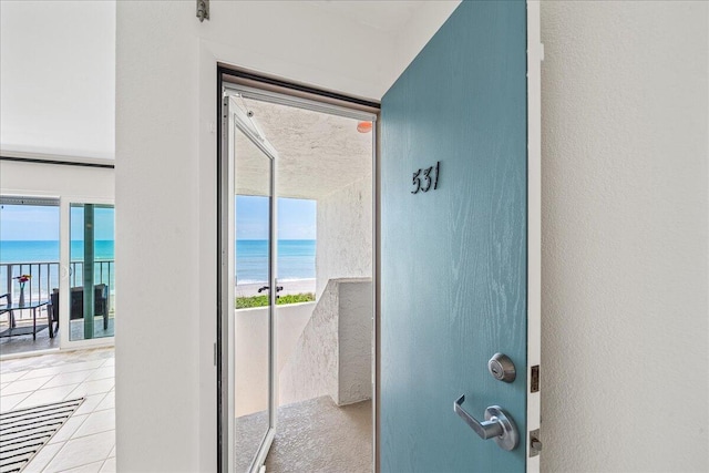2101 Atlantic St Unit 531, Melbourne Beach, FL 32951 - doorway featuring a water view and tile patterned floors