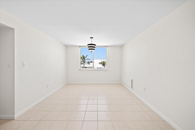 2101 Atlantic St Unit 531, Melbourne Beach, FL 32951 - empty room featuring baseboards and a textured wall