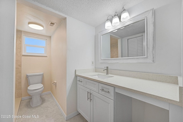 full bathroom with a textured ceiling, vanity, visible vents, toilet, and baseboards