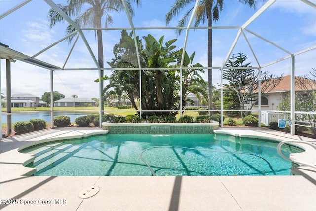 pool with a water view, a patio, and a lanai