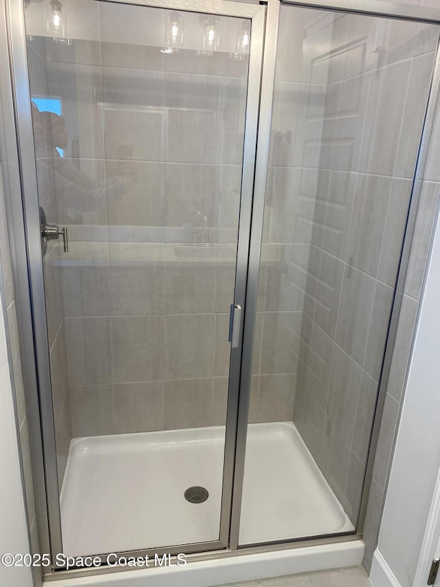 bathroom with a stall shower