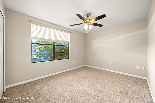 508 Carriage Rd, Indian Harbour Beach, FL 32937 - empty room featuring ceiling fan, carpet flooring, and baseboards