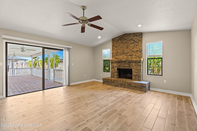 508 Carriage Rd, Indian Harbour Beach, FL 32937 - unfurnished living room featuring ceiling fan, baseboards, and a wealth of natural light