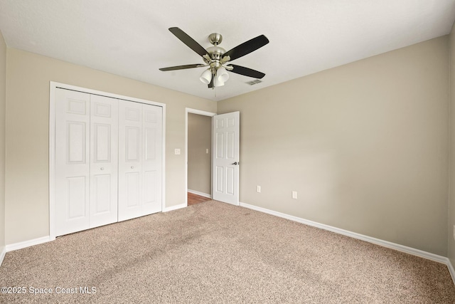 508 Carriage Rd, Indian Harbour Beach, FL 32937 - unfurnished bedroom featuring carpet, visible vents, a closet, and baseboards