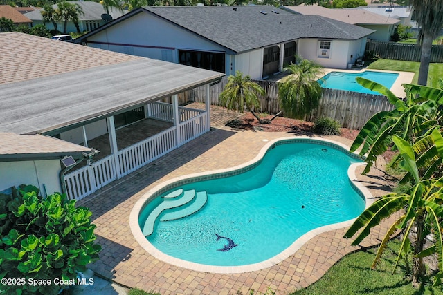 508 Carriage Rd, Indian Harbour Beach, FL 32937 - view of swimming pool featuring a patio, a fenced backyard, and a fenced in pool