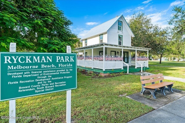 1700 Atlantic St Unit 12, Melbourne Beach, FL 32951 - exterior space with a front yard and a porch