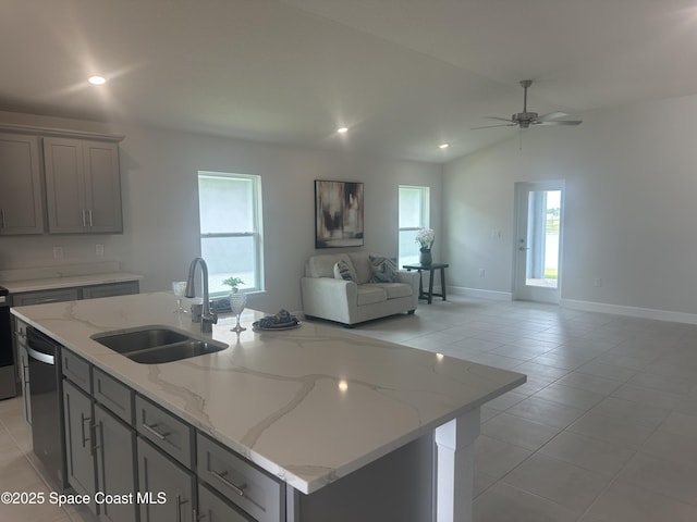 1136 Kylar Dr, Palm Bay, FL 32907 - kitchen with a sink, gray cabinets, open floor plan, and dishwasher