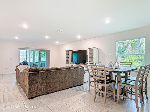 1314 Victory Palm Dr, Edgewater, FL 32132 - living room with recessed lighting, light tile patterned floors, visible vents, and baseboards