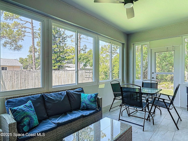1314 Victory Palm Dr, Edgewater, FL 32132 - sunroom / solarium featuring ceiling fan, outdoor dining space, and an outdoor hangout area