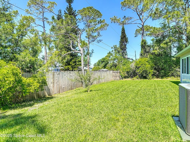 1314 Victory Palm Dr, Edgewater, FL 32132 - view of yard with fence and cooling unit