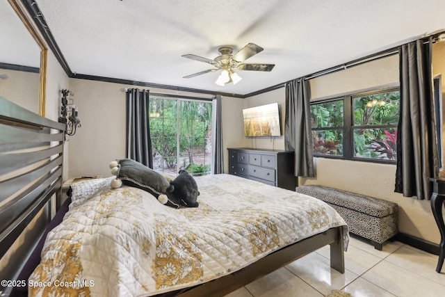 bedroom with light tile patterned floors, a textured ceiling, and ornamental molding