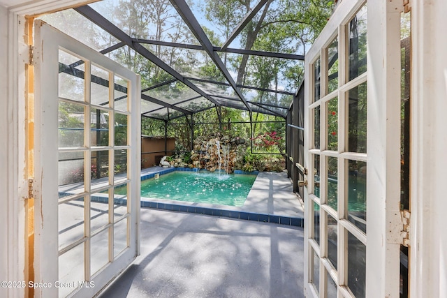 unfurnished sunroom featuring french doors