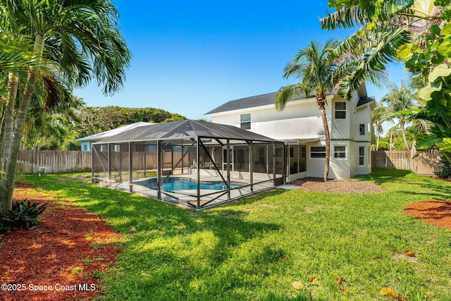 6765 Angeles Rd, Melbourne Beach, FL 32951 - view of pool featuring a patio and a lanai