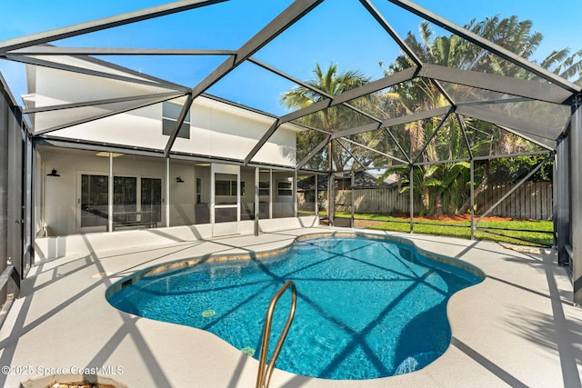 6765 Angeles Rd, Melbourne Beach, FL 32951 - view of pool featuring a patio area, a fenced backyard, and glass enclosure