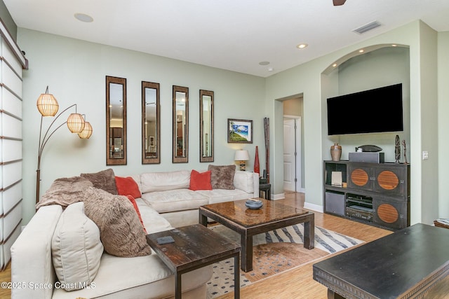 897 Yellow Wood Ct SE, Palm Bay, FL 32909 - living room with visible vents, baseboards, recessed lighting, and light wood-style floors