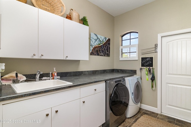 897 Yellow Wood Ct SE, Palm Bay, FL 32909 - clothes washing area with a sink, washer and dryer, tile patterned floors, baseboards, and cabinet space