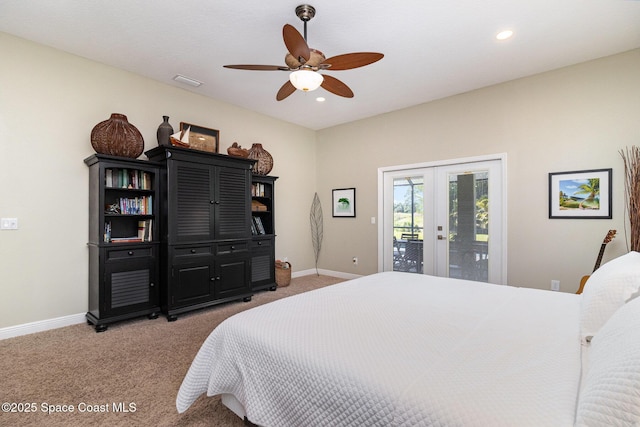 897 Yellow Wood Ct SE, Palm Bay, FL 32909 - bedroom with light carpet, french doors, access to outside, and baseboards