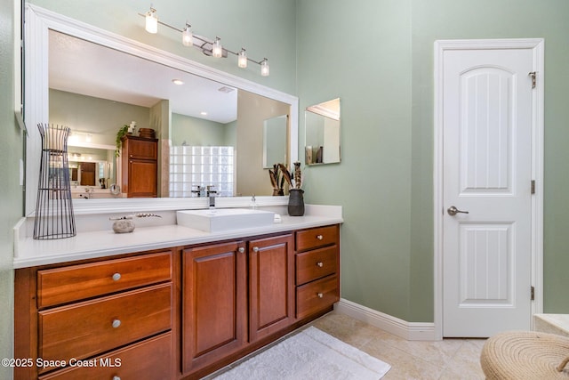 897 Yellow Wood Ct SE, Palm Bay, FL 32909 - full bathroom featuring tile patterned floors, vanity, and baseboards