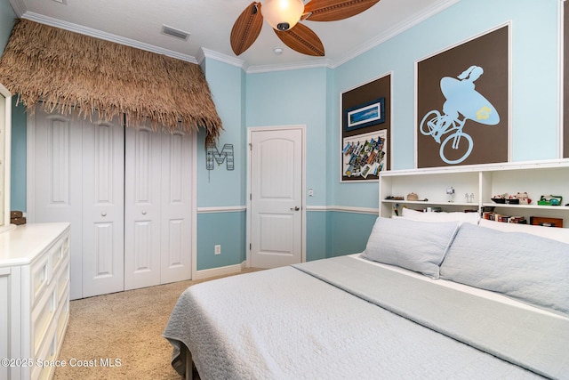 897 Yellow Wood Ct SE, Palm Bay, FL 32909 - bedroom with a closet, crown molding, visible vents, ceiling fan, and light colored carpet