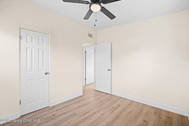 1800 Elmwood Dr, Melbourne, FL 32935 - unfurnished bedroom featuring visible vents, baseboards, and light wood finished floors