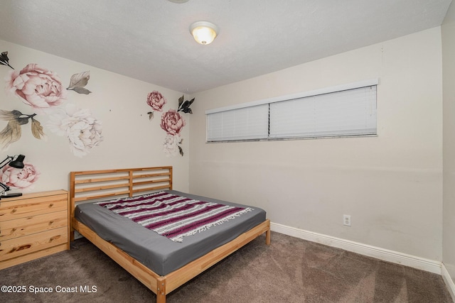 100 Barbados Dr, Merritt Island, FL 32952 - bedroom with baseboards and carpet floors