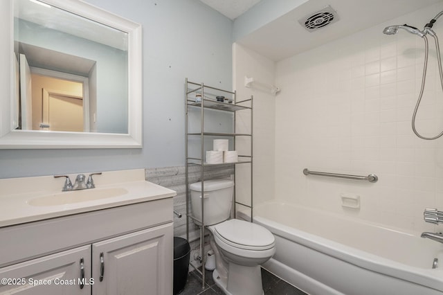 100 Barbados Dr, Merritt Island, FL 32952 - full bath featuring shower / bath combination, visible vents, vanity, and toilet