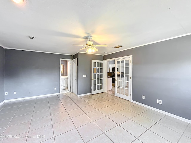 2543 Hathaway Dr, Cocoa, FL 32926 - tiled empty room featuring baseboards, crown molding, a ceiling fan, and french doors