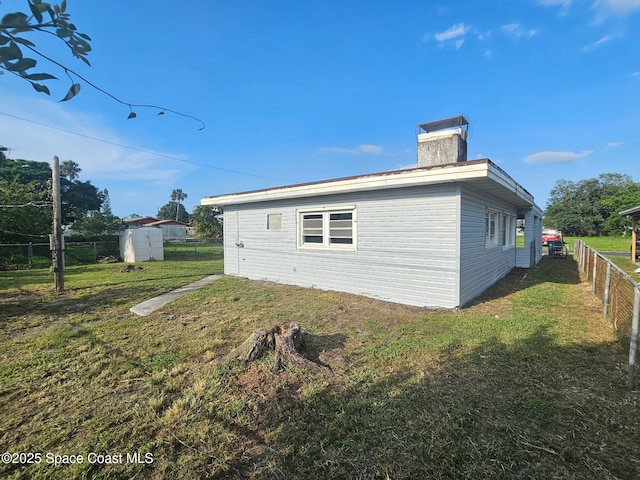 2543 Hathaway Dr, Cocoa, FL 32926 - view of home's exterior featuring a chimney