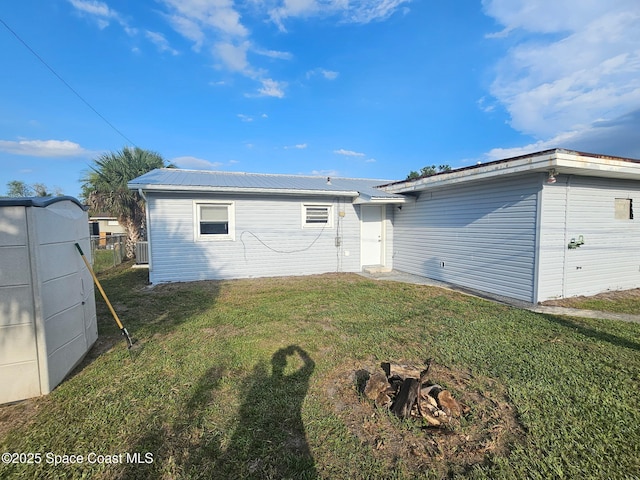 2543 Hathaway Dr, Cocoa, FL 32926 - rear view of house with metal roof