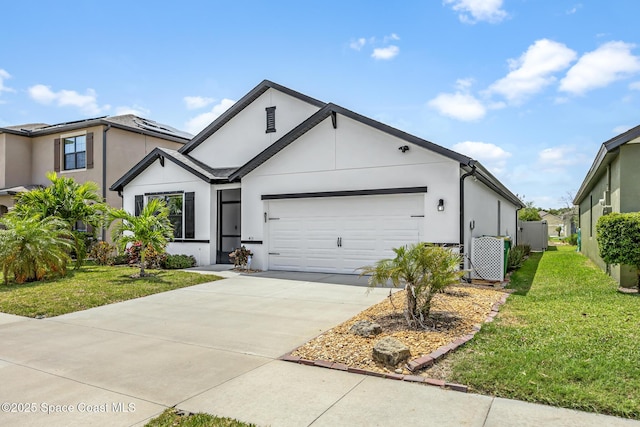 413 Catfish Pl, Cocoa, FL 32927 - ranch-style home with stucco siding, an attached garage, and a front lawn