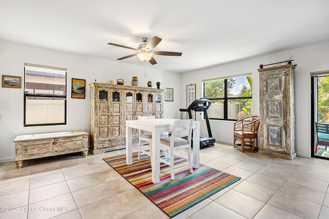 413 Catfish Pl, Cocoa, FL 32927 - exercise area with ceiling fan and light tile patterned flooring