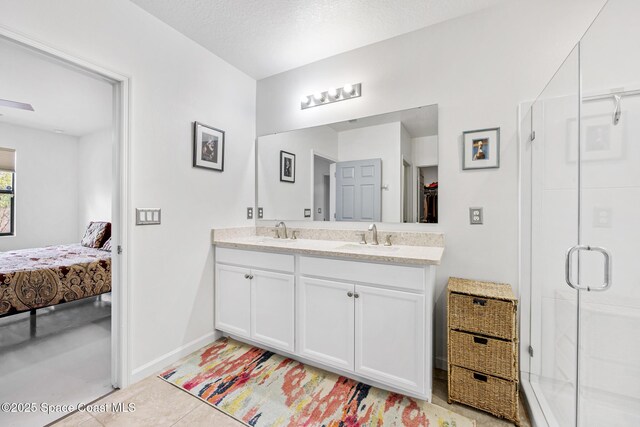 413 Catfish Pl, Cocoa, FL 32927 - full bath featuring a sink, a stall shower, ensuite bath, and double vanity