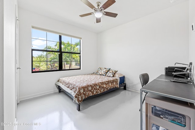 413 Catfish Pl, Cocoa, FL 32927 - bedroom with finished concrete flooring, baseboards, and ceiling fan