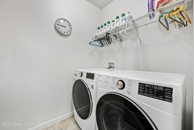 413 Catfish Pl, Cocoa, FL 32927 - laundry room featuring laundry area, baseboards, and washer and dryer