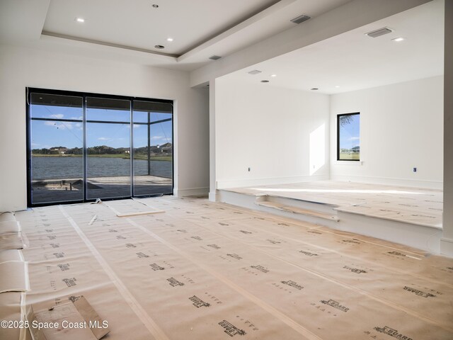 3717 Upper Floridian Way, Rockledge, FL 32955 - unfurnished room with healthy amount of natural light, recessed lighting, and a water view