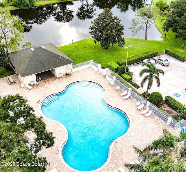 2544 Ventura Cir, Melbourne, FL 32904 - community pool with a patio and fence