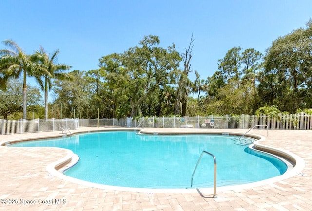 2544 Ventura Cir, Melbourne, FL 32904 - community pool featuring a patio area and fence