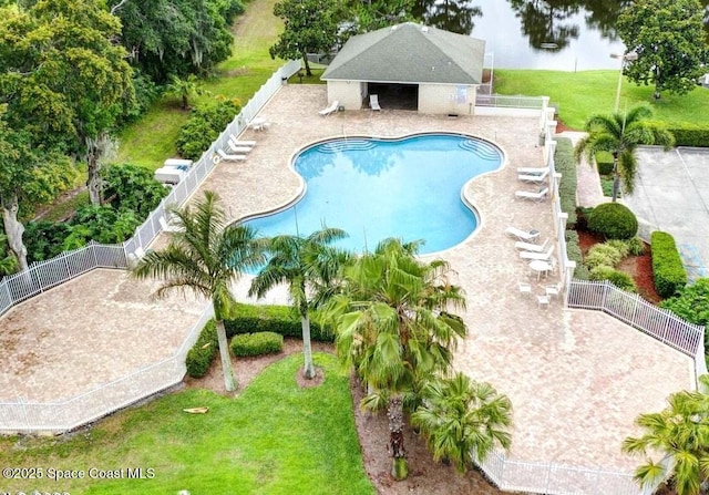 2544 Ventura Cir, Melbourne, FL 32904 - community pool with fence, a patio, and a lawn