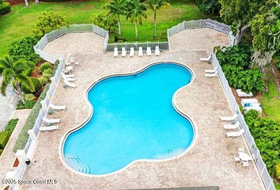 2544 Ventura Cir, Melbourne, FL 32904 - pool featuring a patio area, a fenced backyard, and a lawn