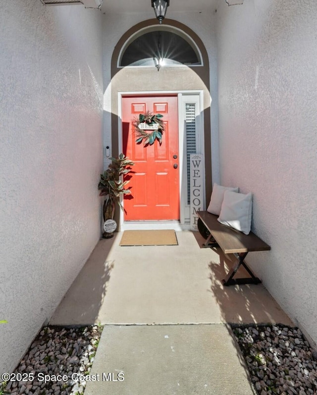 2544 Ventura Cir, Melbourne, FL 32904 - doorway to property featuring stucco siding
