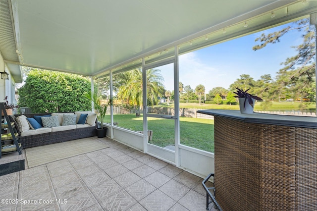 2544 Ventura Cir, Melbourne, FL 32904 - sunroom with an outdoor hangout area