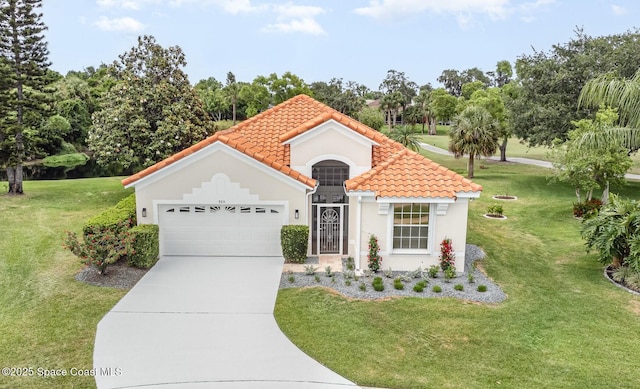 mediterranean / spanish-style house with an attached garage, a front lawn, a tile roof, and driveway