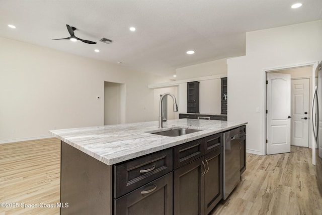 kitchen with a sink, stainless steel appliances, light wood-type flooring, ceiling fan, and recessed lighting