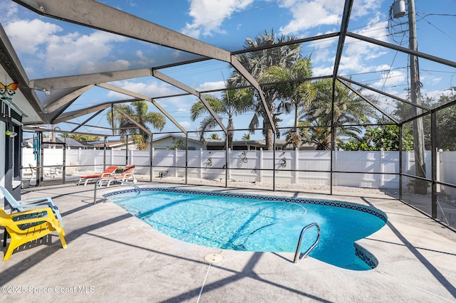 view of pool with a fenced in pool, a lanai, a patio, and a fenced backyard