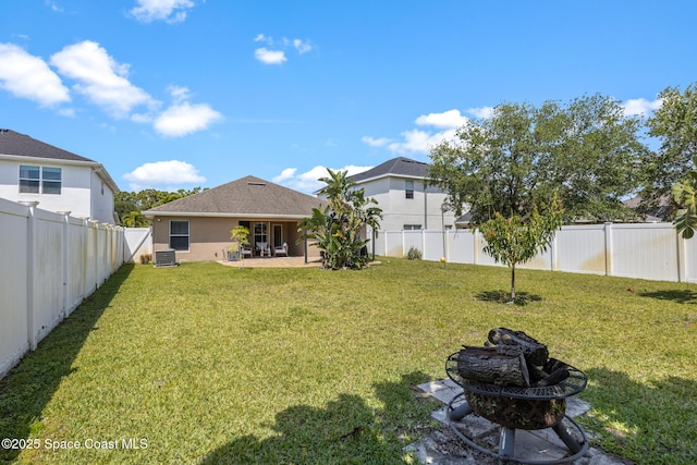 view of yard with a fenced backyard and a patio