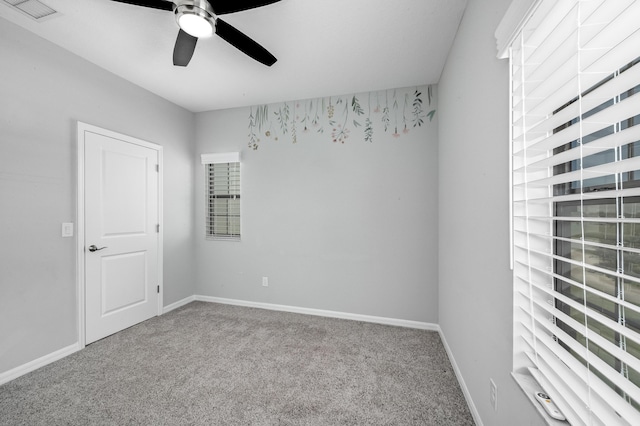 8850 Napolo Dr, Melbourne, FL 32940 - carpeted spare room with visible vents, ceiling fan, and baseboards